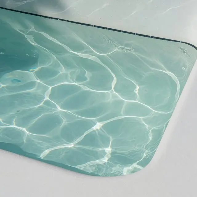 Pool water with an aqua white plaster finish