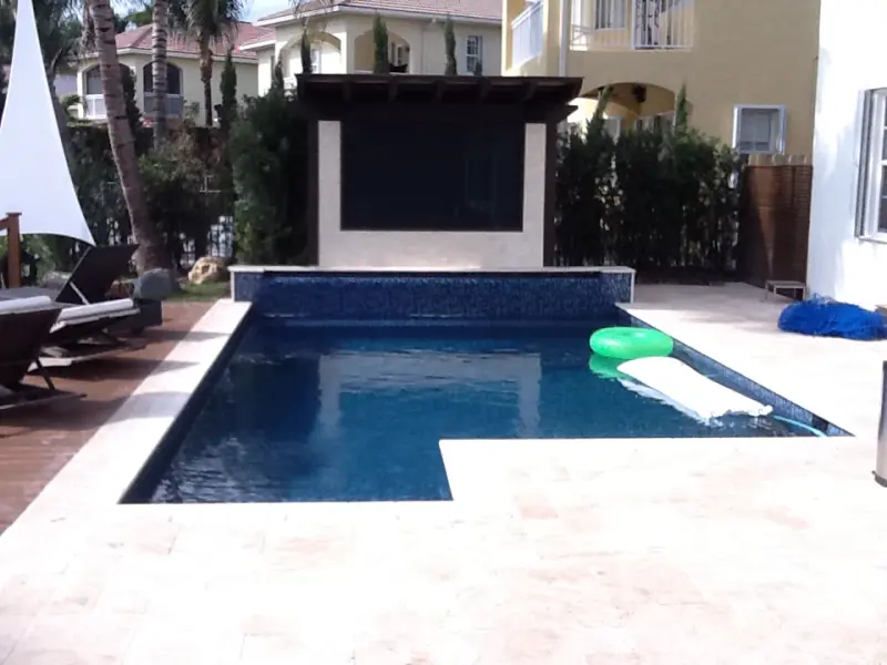 Modern pool with a clean white deck