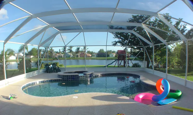 Screened pool overlooking the lake