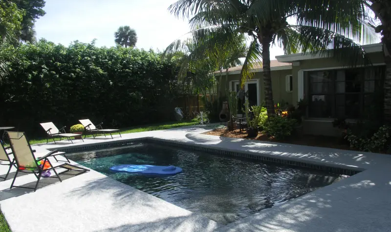 Rectangular pool with a sunny deck